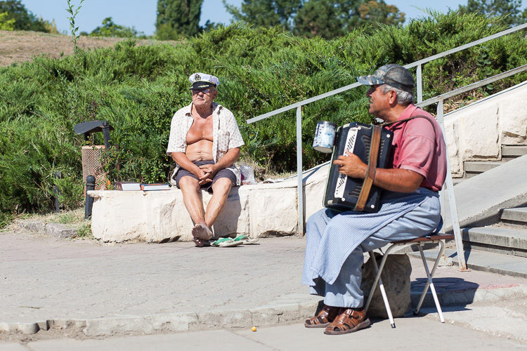 Locals trying to earn a living at an outdoor market in Tiraspol