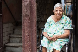 A woman sitting in her doorstep, Havana Vieja
