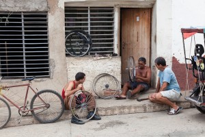 Repairing bicycles in Trinidad