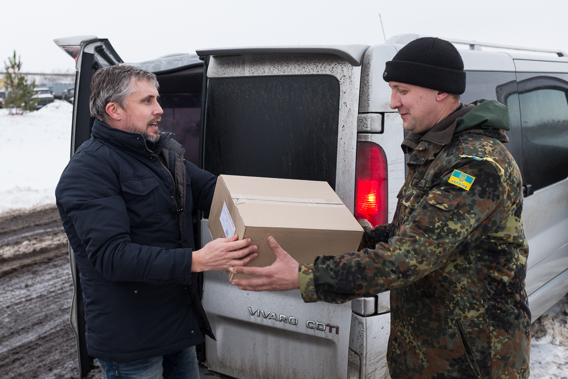 A local brings in more supplies of donated snacks