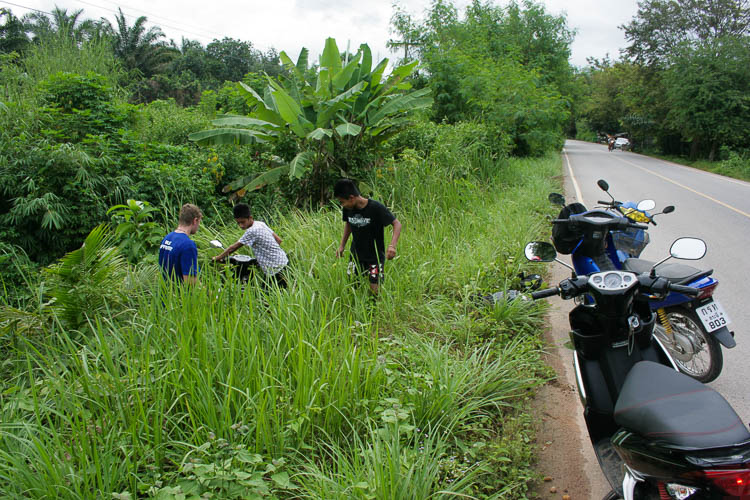 The moment a fellow traveller drove his scooter down a bush in Krabi (Thailand) and almost destroyed it. Locals went for the rescue while I was taking pictures (everything was okay though)