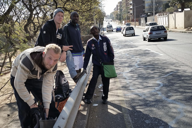 After finding the uncle (in the back on the left), we were waiting for a minivan to get us near a hostel