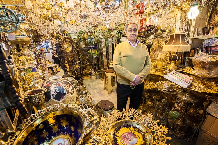 A vendor selling his goods at an indoor market in Tehran, the capital of Iran. Unfortunately only one of the few pictures I took.