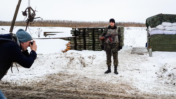 Photographing a soldier at a checkpoint near the former separatist stronghold Sloviansk, Ukraine.
